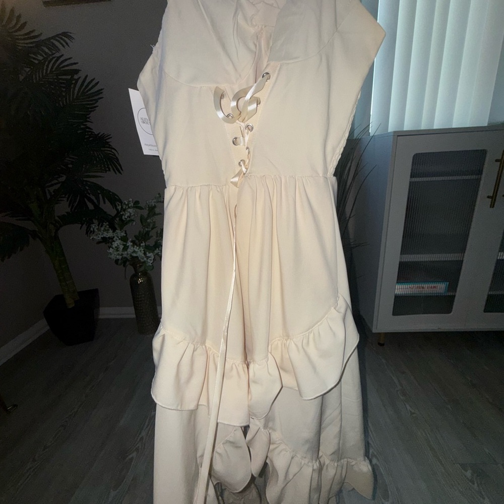 Elegant Cream Dress with Lace-Up Detail